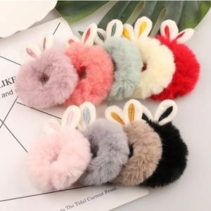 NIB. Plush light pink Bunny ear, ponytail holder